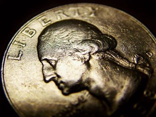 This macro photo of a US Quarter depicts the words Liberty and the man who led the fight for American Liberty, George Washington.  Photo by Rodolfo Clix of Sao Paulo, Brazil.